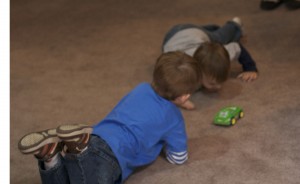 Noah and Brenden were happy to have each other as playmates and enjoyed playing with cars together.