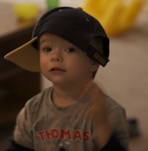 He put on his dad's hat to be funny and I was lucky enough to get a couple of shots.