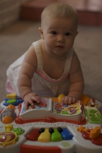 She loves this piano. And anything with buttons.