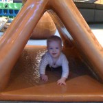 Having fun at a mall play area.